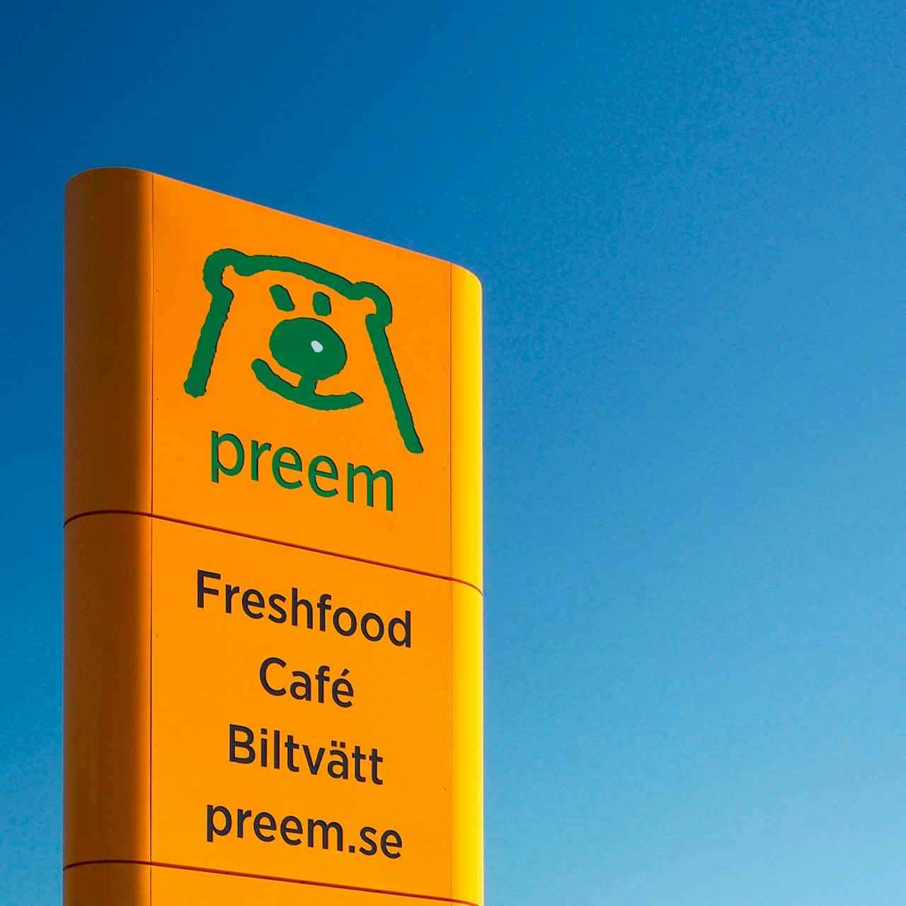 Preem's yellow sign against a blue sky