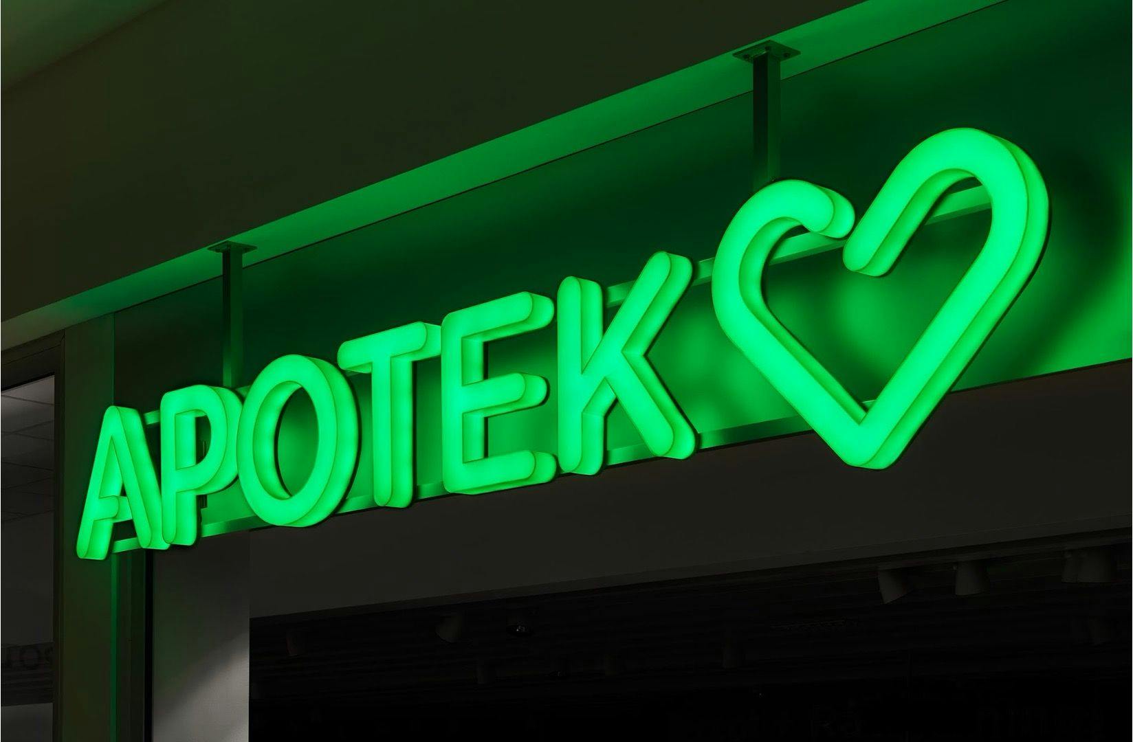 Neon 'APOTEK' sign with a heart, representing Apotek Hjärtat.